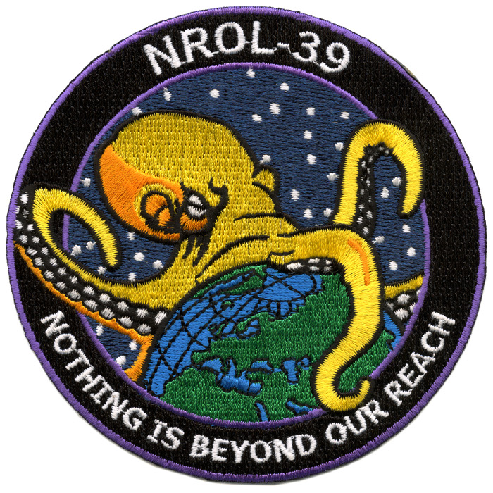 Embroidered patch of world-threatening octopus with tagline 'Nothing is beyond our reach'